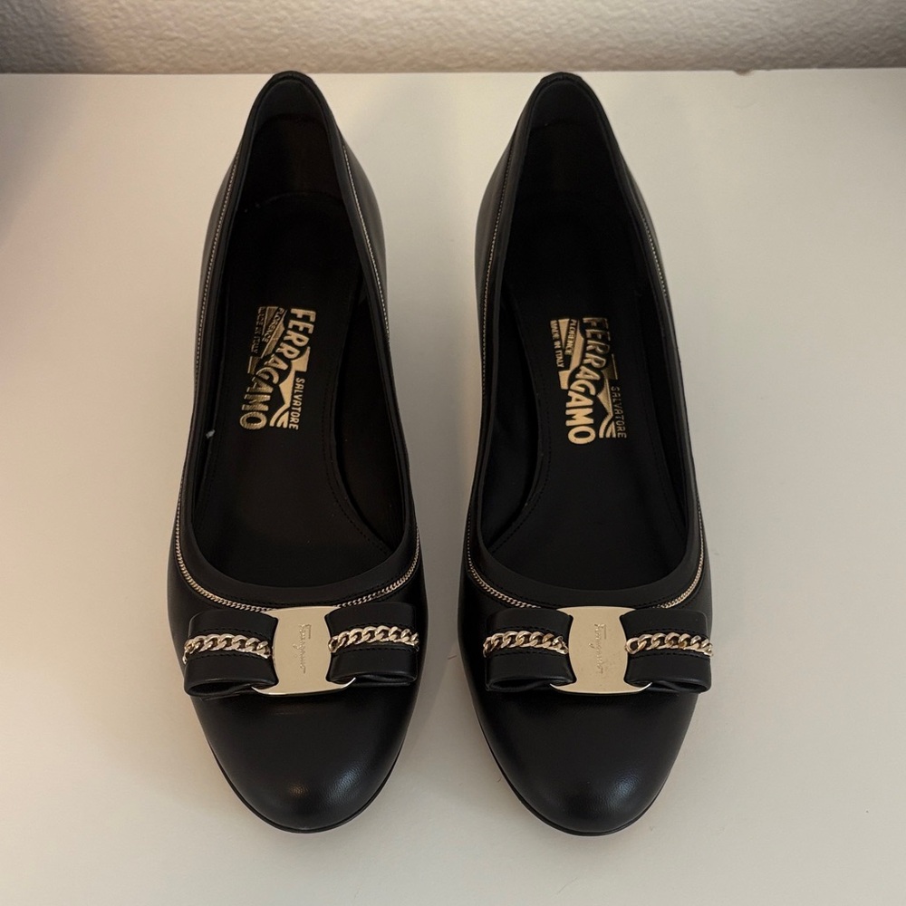 Salvatore Ferragamo Black Flats with Gold Accents
